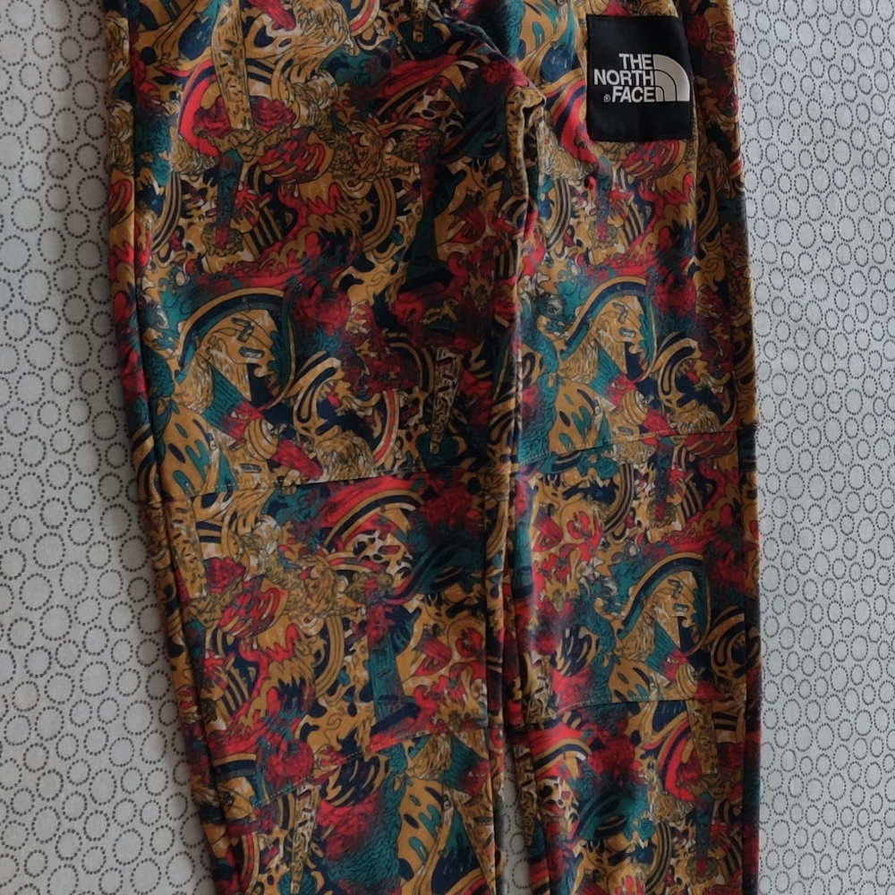 The north face size xs /to yellow,gray, green and